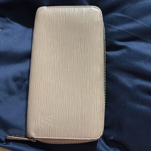Original Louis Vuitton taupe color wallet.